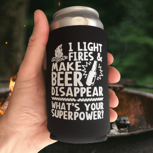 "I Light Fires And Make Beer Disappear, What's Your Superpower?" Can Cooler - 4 Pack